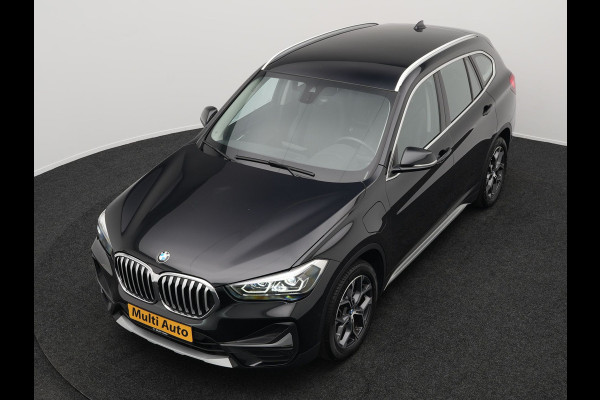 BMW X1 xDrive25e X Line Plug In Hybrid 221pk Dealer O.H. PHEV | Sportstoelen Verwarmd | Adaptive Cruise | Navigatie | Sfeerverlichting | Climate Control | DAB | LED Koplampen | L.M. 18" |