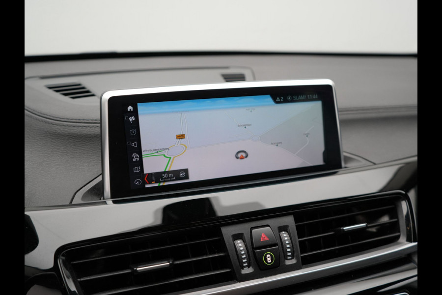 BMW X1 xDrive25e X Line Plug In Hybrid 221pk Dealer O.H. PHEV | Sportstoelen Verwarmd | Adaptive Cruise | Navigatie | Sfeerverlichting | Climate Control | DAB | LED Koplampen | L.M. 18" |