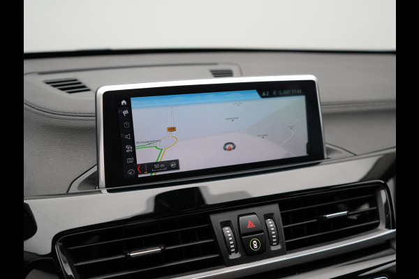 BMW X1 xDrive25e X Line Plug In Hybrid 221pk Dealer O.H. PHEV | Sportstoelen Verwarmd | Adaptive Cruise | Navigatie | Sfeerverlichting | Climate Control | DAB | LED Koplampen | L.M. 18" |