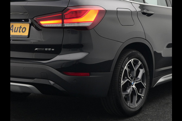 BMW X1 xDrive25e X Line Plug In Hybrid 221pk Dealer O.H. PHEV | Sportstoelen Verwarmd | Adaptive Cruise | Navigatie | Sfeerverlichting | Climate Control | DAB | LED Koplampen | L.M. 18" |