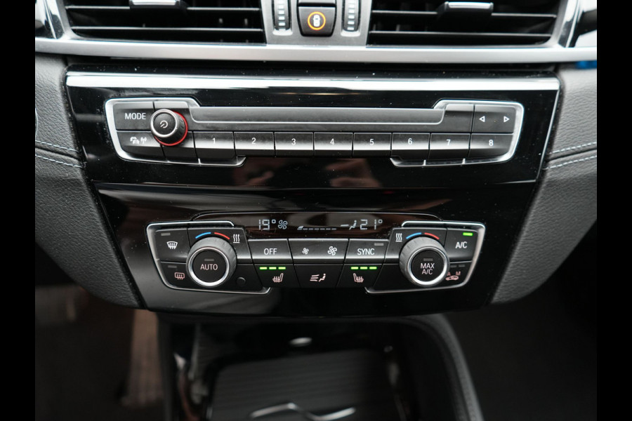 BMW X1 xDrive25e X Line Plug In Hybrid 221pk Dealer O.H. PHEV | Sportstoelen Verwarmd | Adaptive Cruise | Navigatie | Sfeerverlichting | Climate Control | DAB | LED Koplampen | L.M. 18" |
