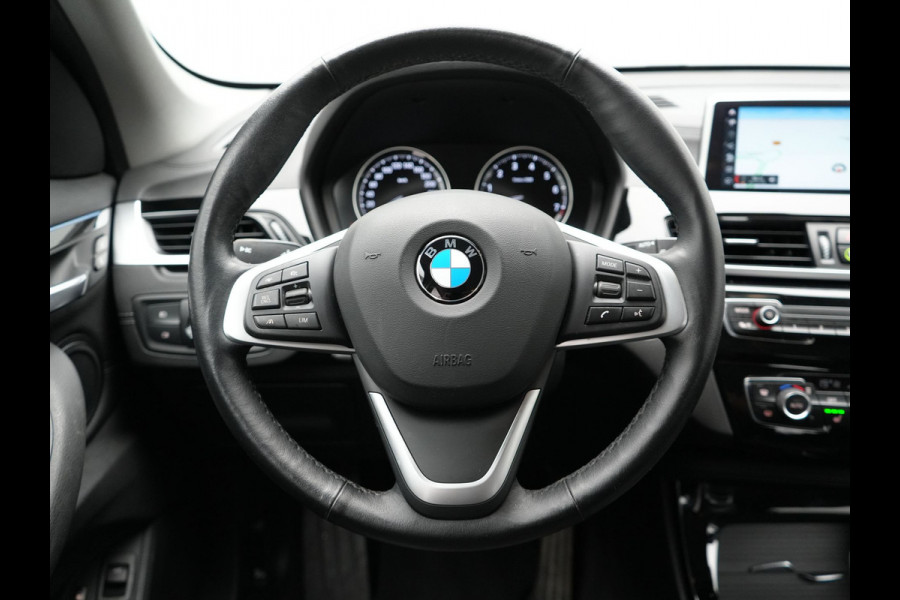 BMW X1 xDrive25e X Line Plug In Hybrid 221pk Dealer O.H. PHEV | Sportstoelen Verwarmd | Adaptive Cruise | Navigatie | Sfeerverlichting | Climate Control | DAB | LED Koplampen | L.M. 18" |