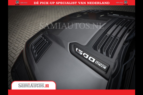 Dodge Ram 1500 SPORT | BOM VOL | 402PK HEMI 5,7 V8 | LUCHTVERING | BED SLIDE | PANO | ADAPTIVE CRUISE | 360 CAMERA | EN VEEL MEER | DUBBELE CABINE | 5 PERSOONS | LAGE KM STAND | GRANITE |