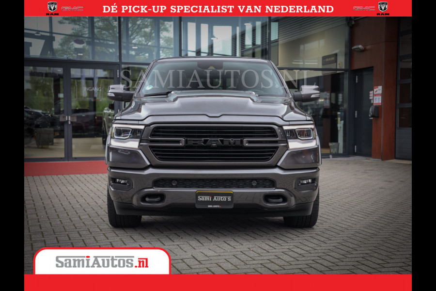 Dodge Ram 1500 SPORT | BOM VOL | 402PK HEMI 5,7 V8 | LUCHTVERING | BED SLIDE | PANO | ADAPTIVE CRUISE | 360 CAMERA | EN VEEL MEER | DUBBELE CABINE | 5 PERSOONS | LAGE KM STAND | GRANITE |