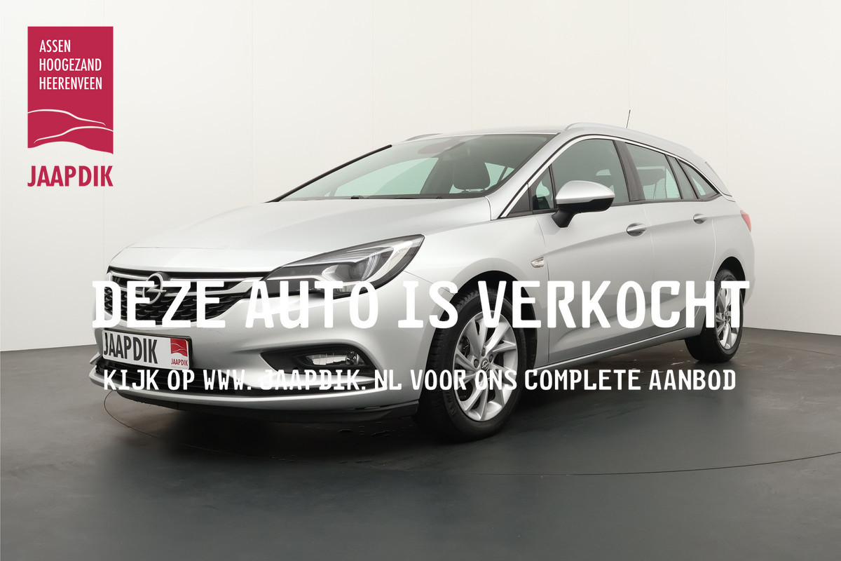 Opel Astra Sports Tourer BWJ 2019 | 1.0 Turbo 105PK Innovation | CLIMA | CAMERA A | CARPLAY | NAVI | EL. KOFFERKLEP | PDC | PRIVACY GLASS | KEYLESS | Opel Astra Sports Tourer BWJ 2019 | 1.0 Turbo 105PK Innovation | CLIMA | CAMERA A | CARPLAY | NAVI | EL. KOFFERKLEP | PDC | PRIVACY GLASS | KEYLESS |