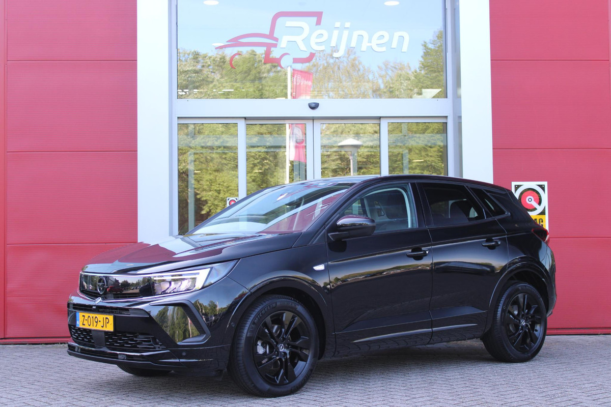 Opel Grandland 1.2 Turbo 136PK AUTOMAAT Hybrid GS | BLACK PACK | STOEL/STUUR VERWARMING | NAVIGATIE | APPLE CARPLAY/ANDROID AUTO | DODEHOEK DETECTIE | 18" LICHTMETALEN VELGEN | DAB+ RADIO | PARKEERSENSOREN VOOR + ACHTER | ADAPTIVE CRUISE CONTROL | ACHTERUITRIJ CAMERA | Opel Grandland 1.2 Turbo 136PK AUTOMAAT Hybrid GS | BLACK PACK | STOEL/STUUR VERWARMING | NAVIGATIE | APPLE CARPLAY/ANDROID AUTO | DODEHOEK DETECTIE | 18" LICHTMETALEN VELGEN | DAB+ RADIO | PARKEERSENSOREN VOOR + ACHTER | ADAPTIVE CRUISE CONTROL | ACHTERUITRIJ CAMERA |
