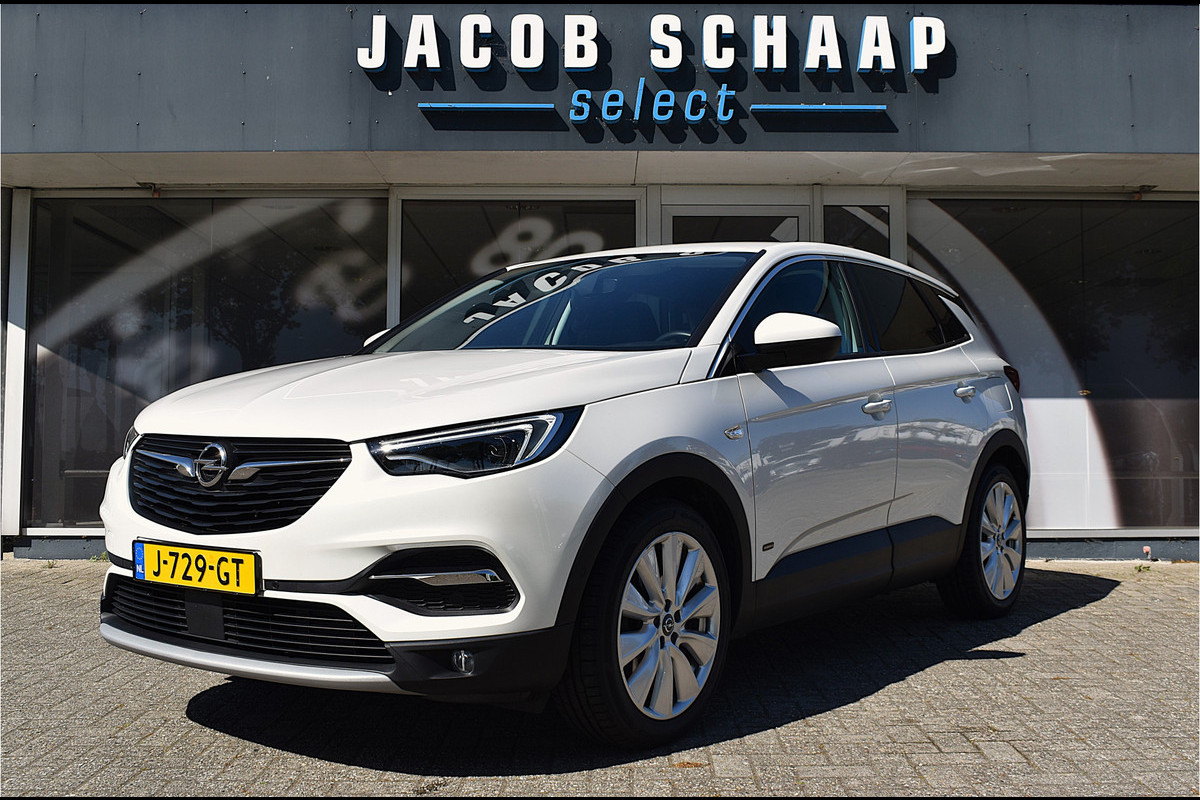 Opel Grandland X 1.6 Turbo Hybrid4 Business Executive / Parkeerhulp / 301 PK / LED / 4X4 / Apple Carplay- android auto / Automaat Opel Grandland X 1.6 Turbo Hybrid4 Business Executive / Parkeerhulp / 301 PK / LED / 4X4 / Apple Carplay- android auto / Automaat