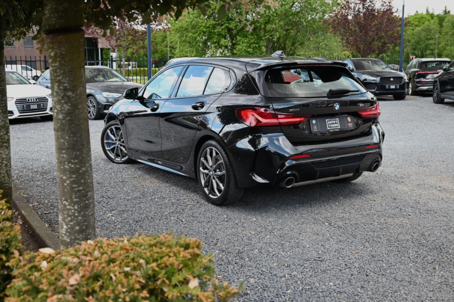 BMW 1-serie M135i xDrive High Executive 306 PK Dealer o.h. Adaptive Head Up Camera Keyless 18''