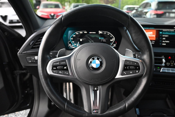 BMW 1-serie M135i xDrive High Executive 306 PK Dealer o.h. Adaptive Head Up Camera Keyless 18''
