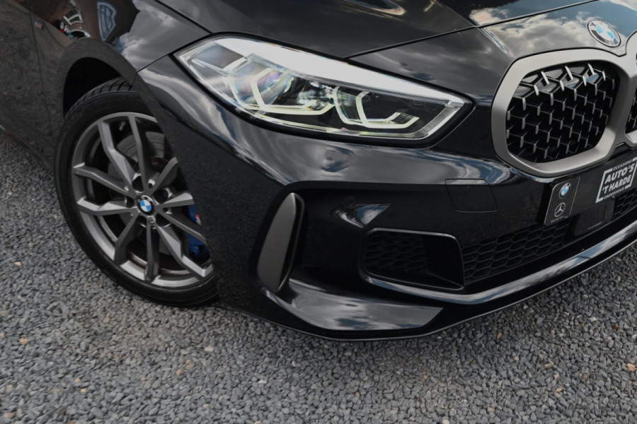 BMW 1-serie M135i xDrive High Executive 306 PK Dealer o.h. Adaptive Head Up Camera Keyless 18''