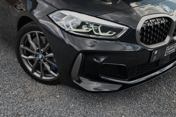 BMW 1-serie M135i xDrive High Executive 306 PK Dealer o.h. Adaptive Head Up Camera Keyless 18''