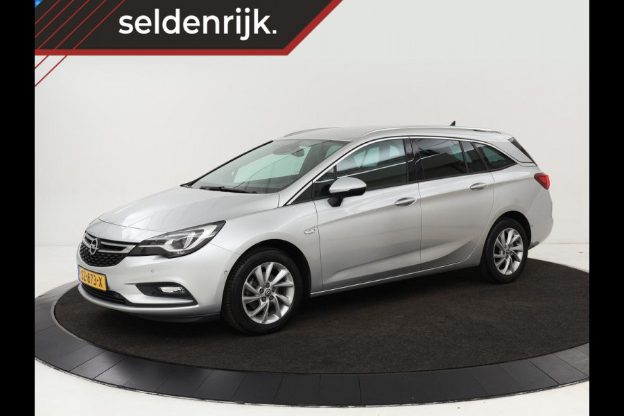 Opel Astra Sports Tourer 1.4 Innovation | Trekhaak | Apple Carplay | Achteruitrijcamera | Cruise Control | Navigatie | Dodehoek Detectie | DAB | LMV