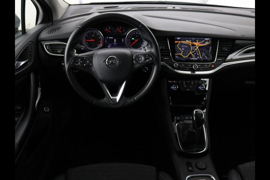 Opel Astra Sports Tourer 1.4 Innovation | Trekhaak | Apple Carplay | Achteruitrijcamera | Cruise Control | Navigatie | Dodehoek Detectie | DAB | LMV