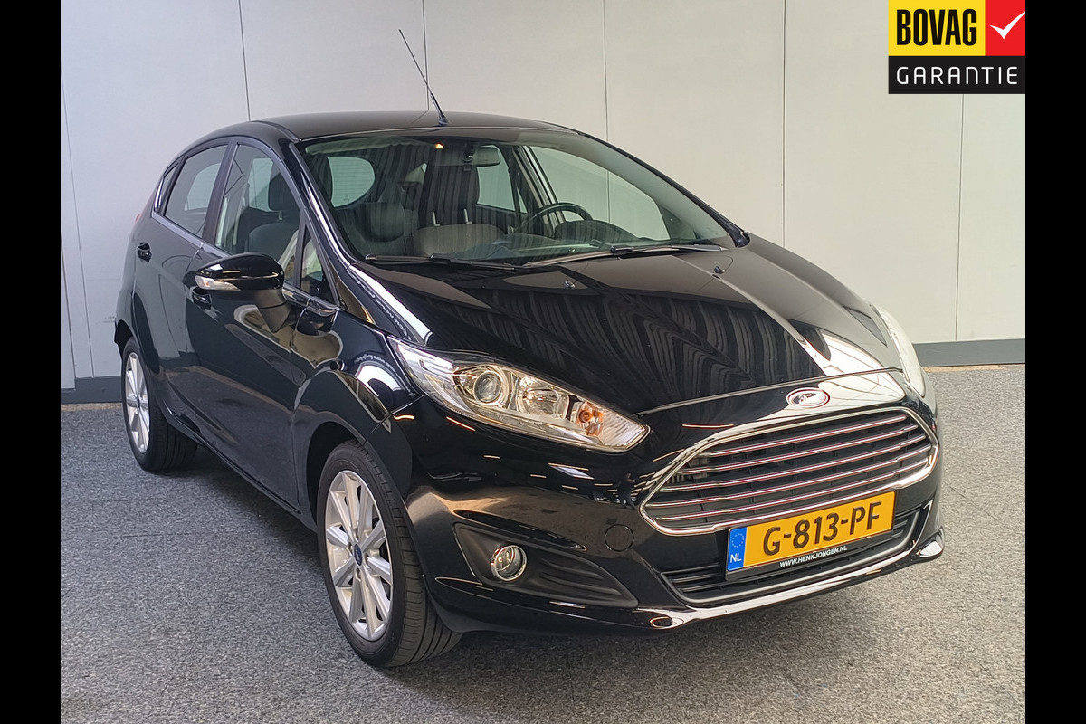 Ford Fiesta 1.0 EcoBoost Titanium Rijklaar + 12 maanden Bovag-garantie Henk Jongen Auto's in Helmond, al 50 jaar service zoals 't hoort! Ford Fiesta 1.0 EcoBoost Titanium Rijklaar + 12 maanden Bovag-garantie Henk Jongen Auto's in Helmond, al 50 jaar service zoals 't hoort!