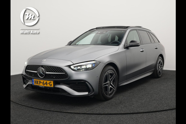 Mercedes-Benz C-Klasse Estate 300 e AMG Line Plug in Hybrid Selenite Magno PHEV | Panodak | Trekhaak af Fabriek | Adaptive Cruise | Elektrische Stoelen met  Memory | Carplay | Sfeerverlichting | MBUX | Navigatie | 360 Camera | DAB | Virtual |