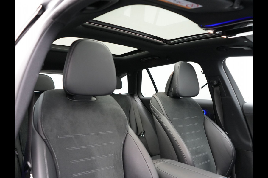 Mercedes-Benz C-Klasse Estate 300 e AMG Line Plug in Hybrid Selenite Magno PHEV | Panodak | Trekhaak af Fabriek | Adaptive Cruise | Elektrische Stoelen met  Memory | Carplay | Sfeerverlichting | MBUX | Navigatie | 360 Camera | DAB | Virtual |