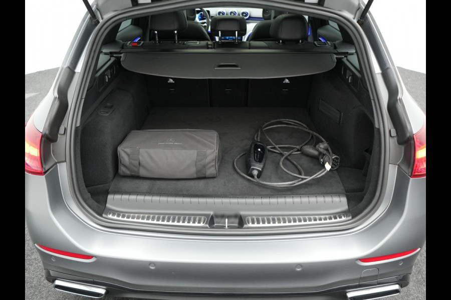 Mercedes-Benz C-Klasse Estate 300 e AMG Line Plug in Hybrid Selenite Magno PHEV | Panodak | Trekhaak af Fabriek | Adaptive Cruise | Elektrische Stoelen met  Memory | Carplay | Sfeerverlichting | MBUX | Navigatie | 360 Camera | DAB | Virtual |