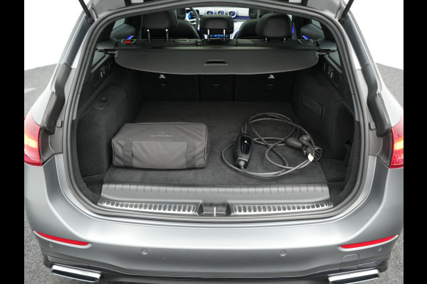 Mercedes-Benz C-Klasse Estate 300 e AMG Line Plug in Hybrid Selenite Magno PHEV | Panodak | Trekhaak af Fabriek | Adaptive Cruise | Elektrische Stoelen met  Memory | Carplay | Sfeerverlichting | MBUX | Navigatie | 360 Camera | DAB | Virtual |
