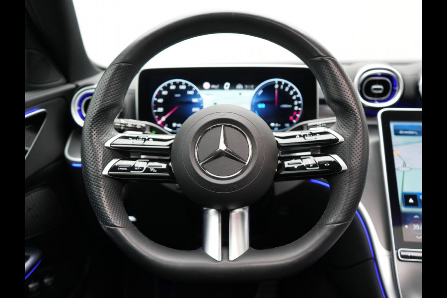 Mercedes-Benz C-Klasse Estate 300 e AMG Line Plug in Hybrid Selenite Magno PHEV | Panodak | Trekhaak af Fabriek | Adaptive Cruise | Elektrische Stoelen met  Memory | Carplay | Sfeerverlichting | MBUX | Navigatie | 360 Camera | DAB | Virtual |