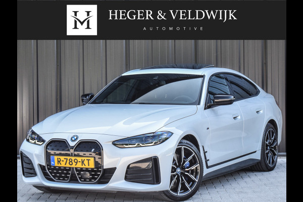 BMW i4 eDrive40 High EXECUTIVE 84 kWh | M-SPORT | SCHUIFDAK | SHADOW-LINE | NL- AUTO | CAMERA | HEAD-UP | TREKHAAK | MEMORY SEATS | AMB