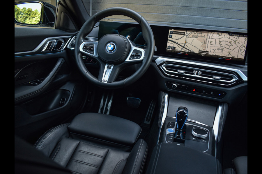 BMW i4 eDrive40 High EXECUTIVE 84 kWh | M-SPORT | SCHUIFDAK | SHADOW-LINE | NL- AUTO | CAMERA | HEAD-UP | TREKHAAK | MEMORY SEATS | AMB