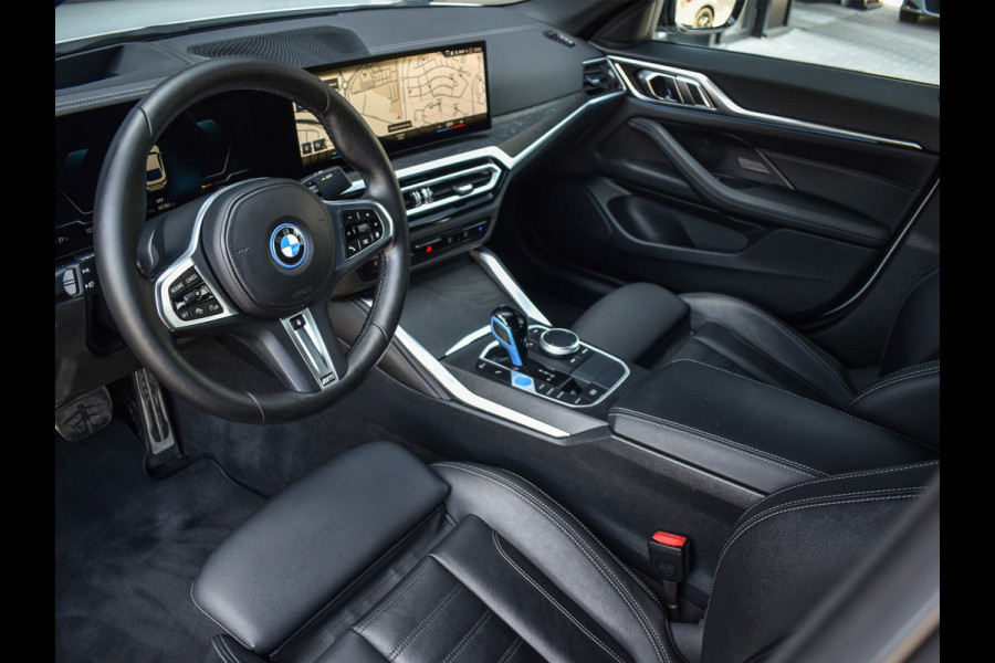 BMW i4 eDrive40 High EXECUTIVE 84 kWh | M-SPORT | SCHUIFDAK | SHADOW-LINE | NL- AUTO | CAMERA | HEAD-UP | TREKHAAK | MEMORY SEATS | AMB
