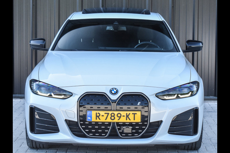 BMW i4 eDrive40 High EXECUTIVE 84 kWh | M-SPORT | SCHUIFDAK | SHADOW-LINE | NL- AUTO | CAMERA | HEAD-UP | TREKHAAK | MEMORY SEATS | AMB