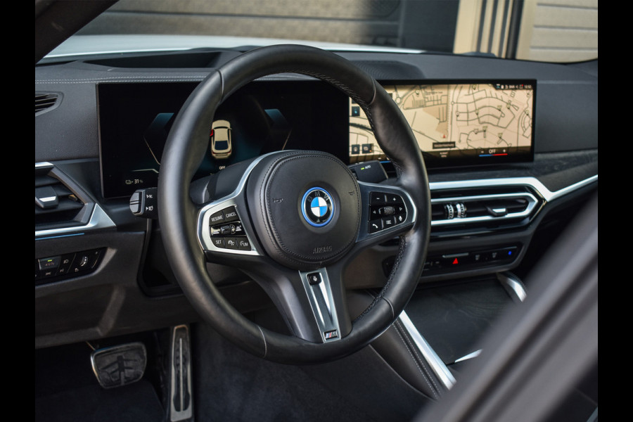 BMW i4 eDrive40 High EXECUTIVE 84 kWh | M-SPORT | SCHUIFDAK | SHADOW-LINE | NL- AUTO | CAMERA | HEAD-UP | TREKHAAK | MEMORY SEATS | AMB