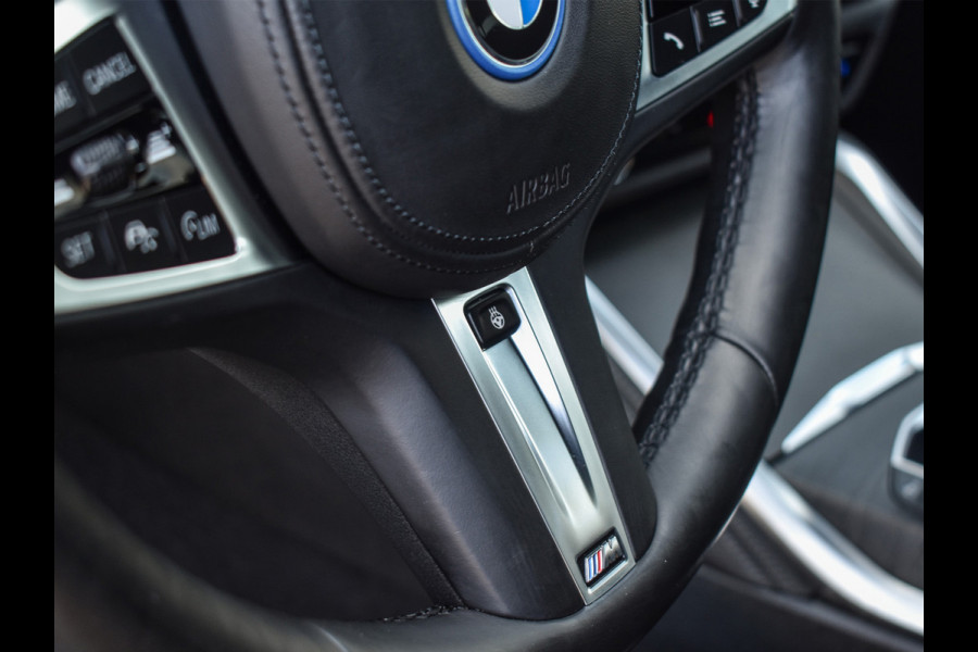 BMW i4 eDrive40 High EXECUTIVE 84 kWh | M-SPORT | SCHUIFDAK | SHADOW-LINE | NL- AUTO | CAMERA | HEAD-UP | TREKHAAK | MEMORY SEATS | AMB
