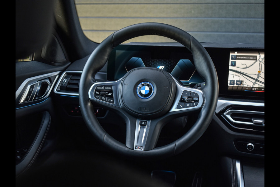 BMW i4 eDrive40 High EXECUTIVE 84 kWh | M-SPORT | SCHUIFDAK | SHADOW-LINE | NL- AUTO | CAMERA | HEAD-UP | TREKHAAK | MEMORY SEATS | AMB