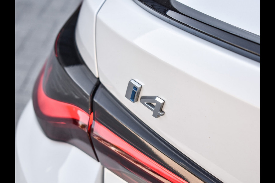 BMW i4 eDrive40 High EXECUTIVE 84 kWh | M-SPORT | SCHUIFDAK | SHADOW-LINE | NL- AUTO | CAMERA | HEAD-UP | TREKHAAK | MEMORY SEATS | AMB