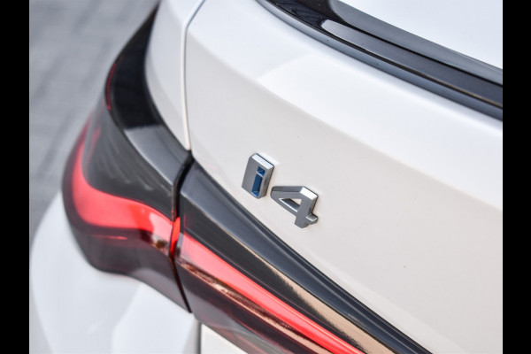 BMW i4 eDrive40 High EXECUTIVE 84 kWh | M-SPORT | SCHUIFDAK | SHADOW-LINE | NL- AUTO | CAMERA | HEAD-UP | TREKHAAK | MEMORY SEATS | AMB