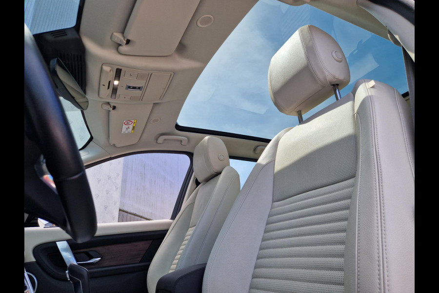 Land Rover Discovery Sport P300e 1.5 HSE | Meridian | Dodehoek | Stoelverwarming | Electrische stoelen | Memory | 360 Camera |