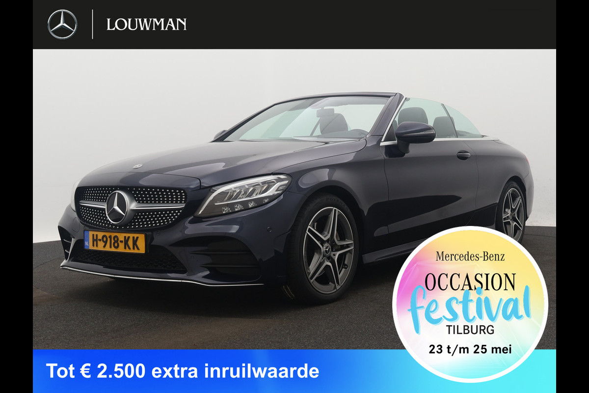 Mercedes-Benz C-Klasse Cabrio 200 Premium Plus Pack | 5 spaaks lichtmetalen velgen | Navigatie | Parking support met Camera achter | Louwman Basispakket met 1 jaar Bovag Garantie. Mercedes-Benz C-Klasse Cabrio 200 Premium Plus Pack | 5 spaaks lichtmetalen velgen | Navigatie | Parking support met Camera achter | Louwman Basispakket met 1 jaar Bovag Garantie.