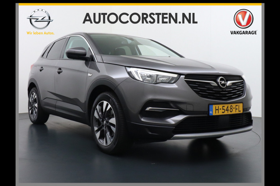 Opel Grandland X T131PK Autom. AGR-Comfort Stoelen Apple Carplay Android Auto Navi Ecc Elek.Achterklep Stuur/Stoelverwarming Cruise Control Pdc K Regen/Lichtsensor Dodehoeksensor Rijstrooksensor Verkeersbordlezer Winterpakket DAB+ Lmv 18" 1.2 Turbo 1e Eigenaar