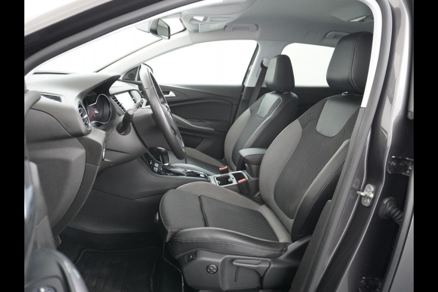 Opel Grandland X T131PK Autom. AGR-Comfort Stoelen Apple Carplay Android Auto Navi Ecc Elek.Achterklep Stuur/Stoelverwarming Cruise Control Pdc K Regen/Lichtsensor Dodehoeksensor Rijstrooksensor Verkeersbordlezer Winterpakket DAB+ Lmv 18" 1.2 Turbo 1e Eigenaar