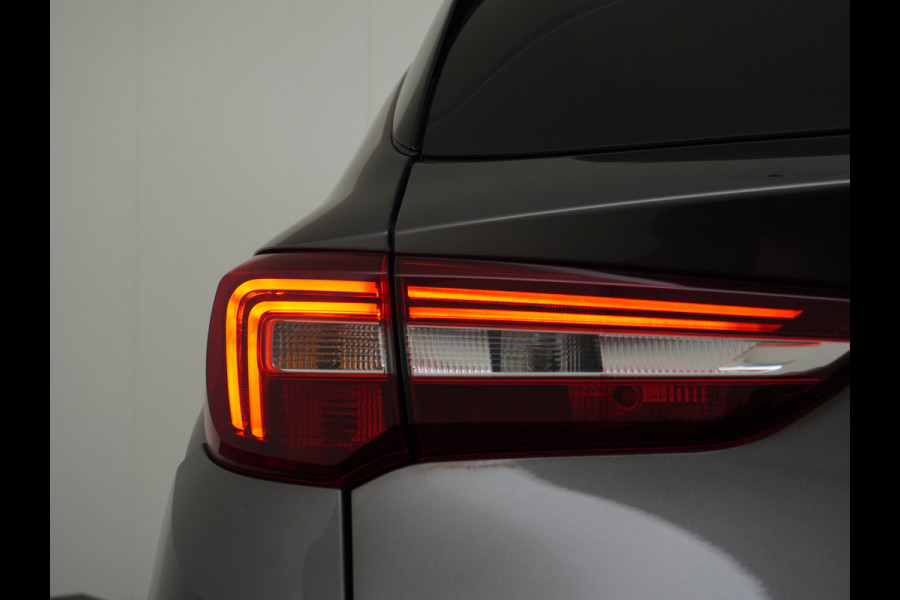 Opel Grandland X T131PK Autom. AGR-Comfort Stoelen Apple Carplay Android Auto Navi Ecc Elek.Achterklep Stuur/Stoelverwarming Cruise Control Pdc K Regen/Lichtsensor Dodehoeksensor Rijstrooksensor Verkeersbordlezer Winterpakket DAB+ Lmv 18" 1.2 Turbo 1e Eigenaar