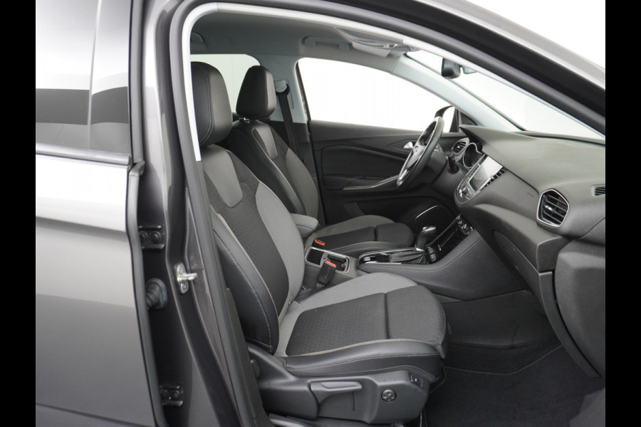 Opel Grandland X T131PK Autom. AGR-Comfort Stoelen Apple Carplay Android Auto Navi Ecc Elek.Achterklep Stuur/Stoelverwarming Cruise Control Pdc K Regen/Lichtsensor Dodehoeksensor Rijstrooksensor Verkeersbordlezer Winterpakket DAB+ Lmv 18" 1.2 Turbo 1e Eigenaar