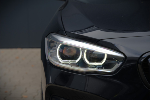 BMW 1-serie 118i High Executive M Sport | Stoelverwarming | Navigatie | Cruise Control | Keyless | LCI2 | Parkeersensoren | DAB | Shadow Line | M Sport Remmen | HIFI | LED