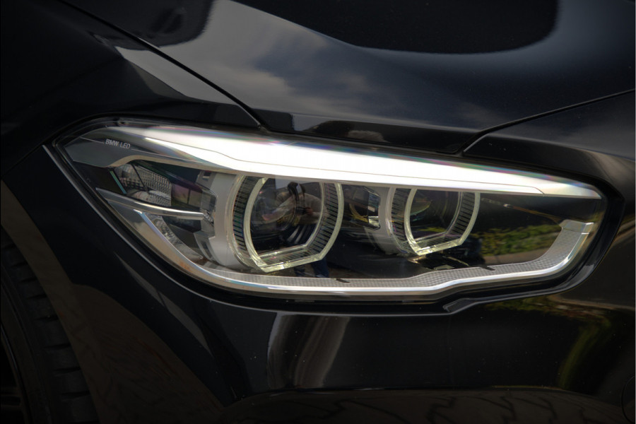 BMW 1-serie 118i High Executive M Sport | Stoelverwarming | Navigatie | Cruise Control | Keyless | LCI2 | Parkeersensoren | DAB | Shadow Line | M Sport Remmen | HIFI | LED