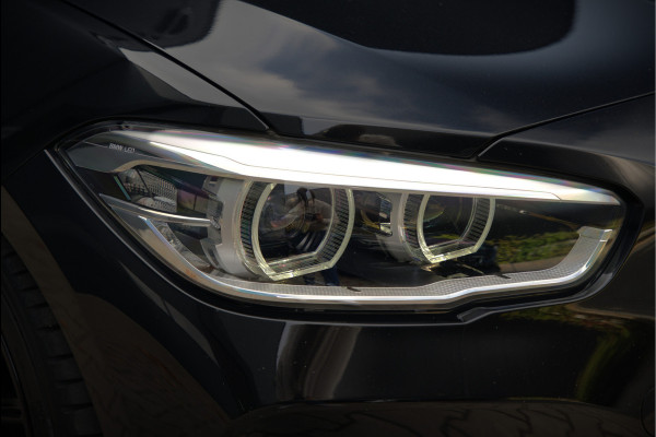 BMW 1-serie 118i High Executive M Sport | Stoelverwarming | Navigatie | Cruise Control | Keyless | LCI2 | Parkeersensoren | DAB | Shadow Line | M Sport Remmen | HIFI | LED