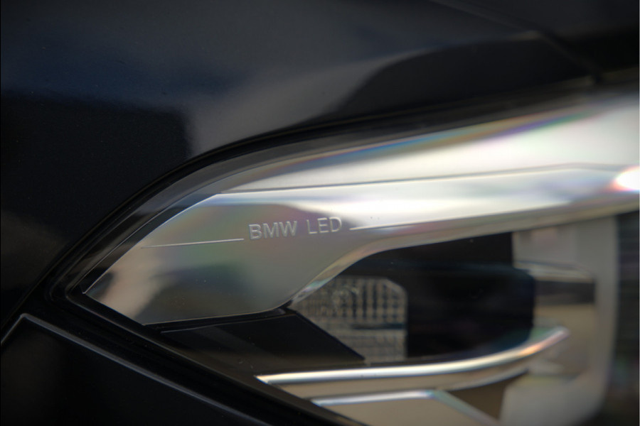 BMW 1-serie 118i High Executive M Sport | Stoelverwarming | Navigatie | Cruise Control | Keyless | LCI2 | Parkeersensoren | DAB | Shadow Line | M Sport Remmen | HIFI | LED