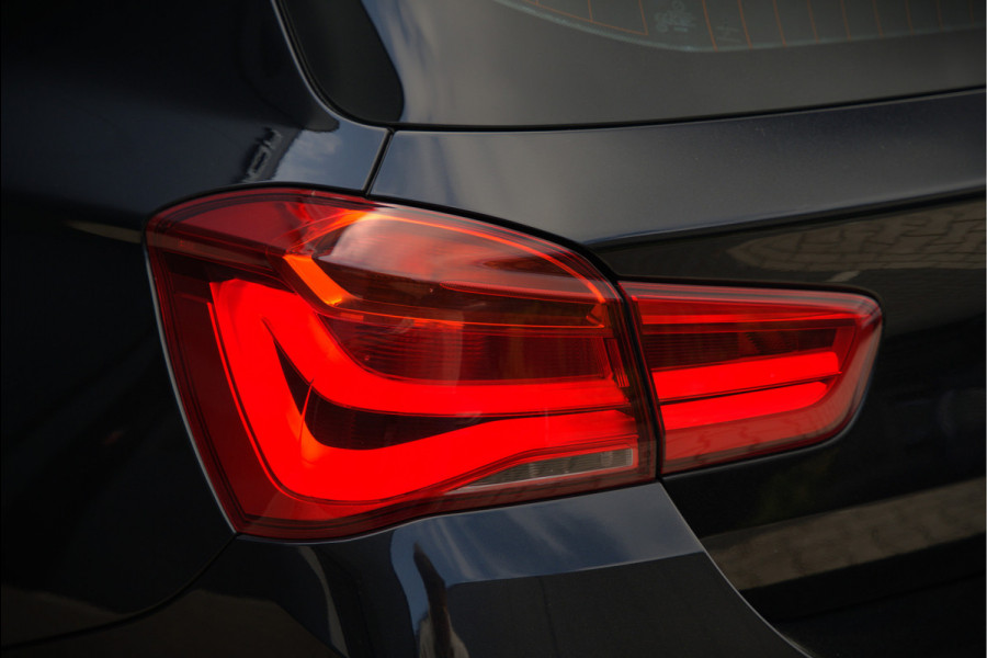 BMW 1-serie 118i High Executive M Sport | Stoelverwarming | Navigatie | Cruise Control | Keyless | LCI2 | Parkeersensoren | DAB | Shadow Line | M Sport Remmen | HIFI | LED