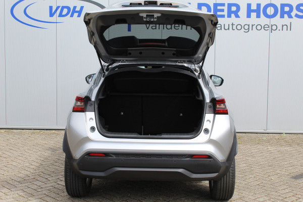Nissan Juke 1.0-117pk DIG-T N-Connecta. Werkelijk in nieuwstaat ! Slechts 12.600km ! Volautm. airco, privacy glass, metallic lak, LM wielen, navigatie, camera, pdc v+a, telefoonvoorb.,  keyless entry&go, LED etc.