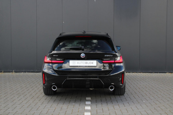 BMW 3 Serie Touring 330e xDrive | M-sport | Pano | Trekhaak