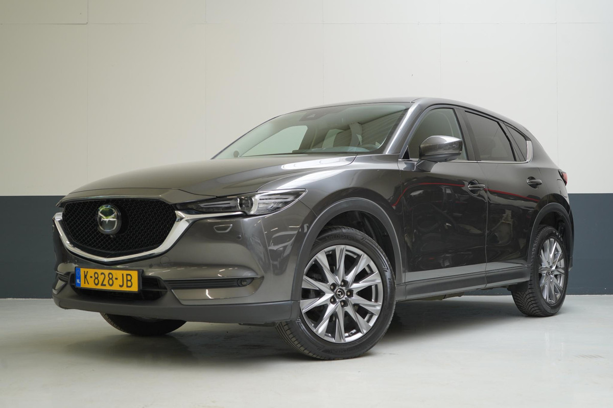 Mazda CX-5 2.0 SkyActiv-G 165 Luxury | Leder | Memory | Stoelverwarming | Stuurverwarming Mazda CX-5 2.0 SkyActiv-G 165 Luxury | Leder | Memory | Stoelverwarming | Stuurverwarming