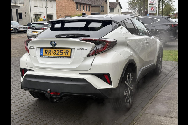 Toyota C-HR 1.8 Hybrid Bi-Tone Plus | Trekhaak, Dodehoekherkenning, Stoel + Stuurverwarming, Parkeersensoren, Navigatie, Keyless, 18inch