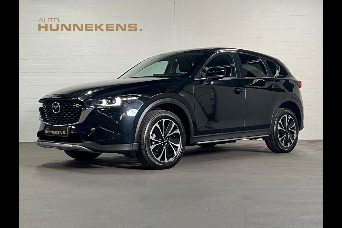 Mazda CX-5 2.5 AWD Newground Leder/Alcantara | 360 Camera | Head-up | Stoel/Stuur verwarming | Cruise & Climate c. Mazda CX-5 2.5 AWD Newground Leder/Alcantara | 360 Camera | Head-up | Stoel/Stuur verwarming | Cruise & Climate c.