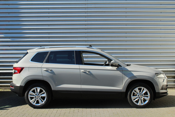 Škoda Karoq 1.0 TSI 116pk Ambition Business Panoramadak NL-Auto NAP Clima Cruise Navi 17"LMV Trekhaak 1200kg