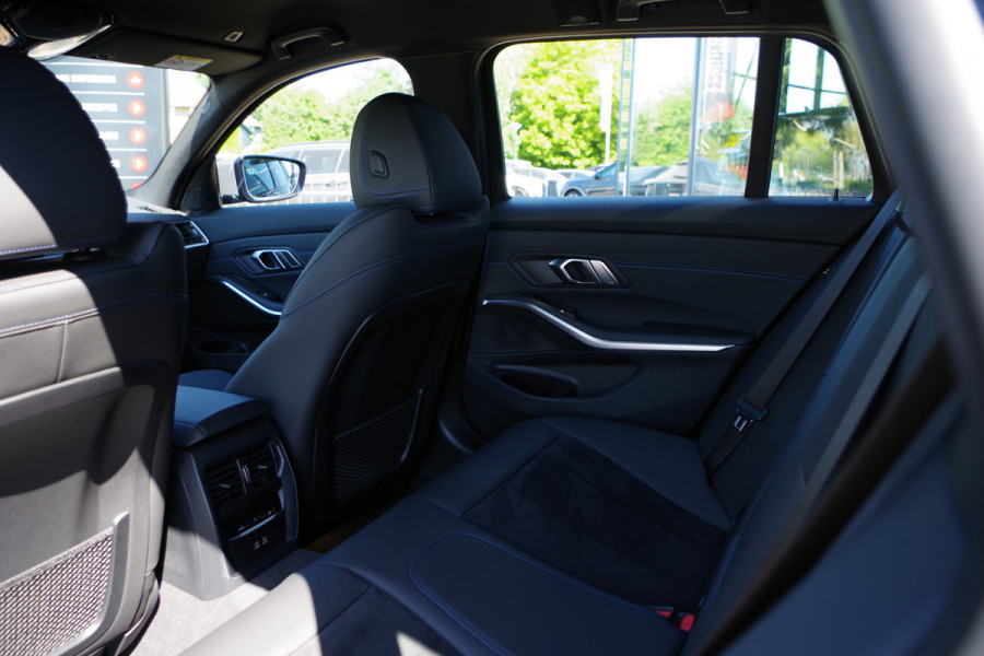 BMW 3 Serie Touring 330e xDrive 293 PK M-Sport PHEV, Dravit Grau, Trekhaak, Memory, Head-Up